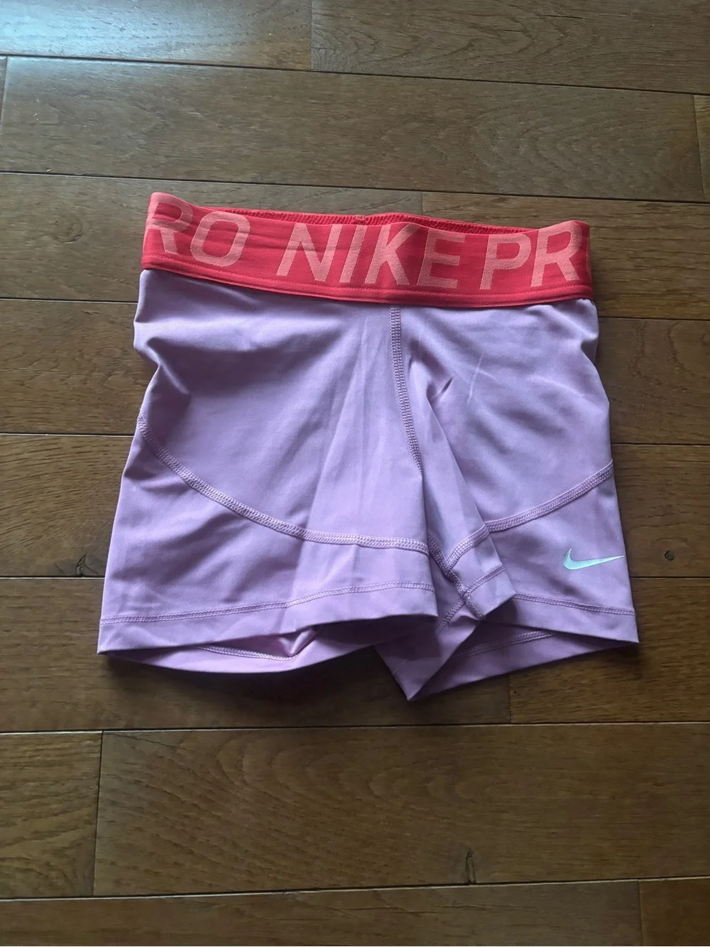 Nike Pro Women’s Pink Training Shorts with Coral Branded Waistband